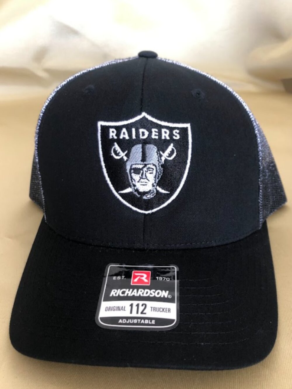 Las Vegas Raiders Black with Grey Mesh Trucker Snapback Hats!